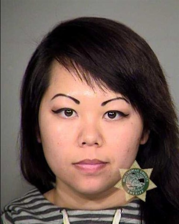 This photo released by the Multnomah County Sheriff's Office shows 26-year-old Nai Mai Chao. Police say Chao, who worked as a nursing assistant, took photos of dying patients at a nursing home and posted them on her Facebook page with demeaning comments.